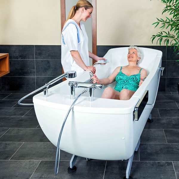 Beka Avero Motion E Bath Tub With Patient And Caregiver